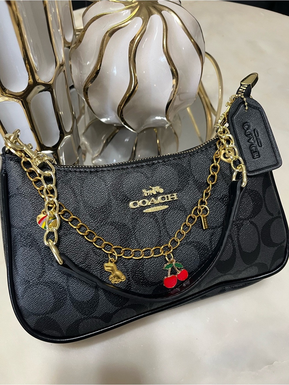 Coach Black Signature Shoulder Bag with Gold Chain and Cherry Charm
